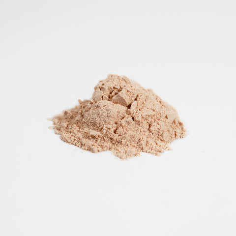 Light brown powder displayed against a clean white background.